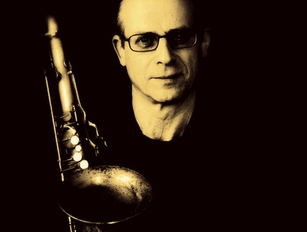 M Levin with sax — sepia